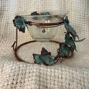Vintage decorative clear bowl with copper stand.